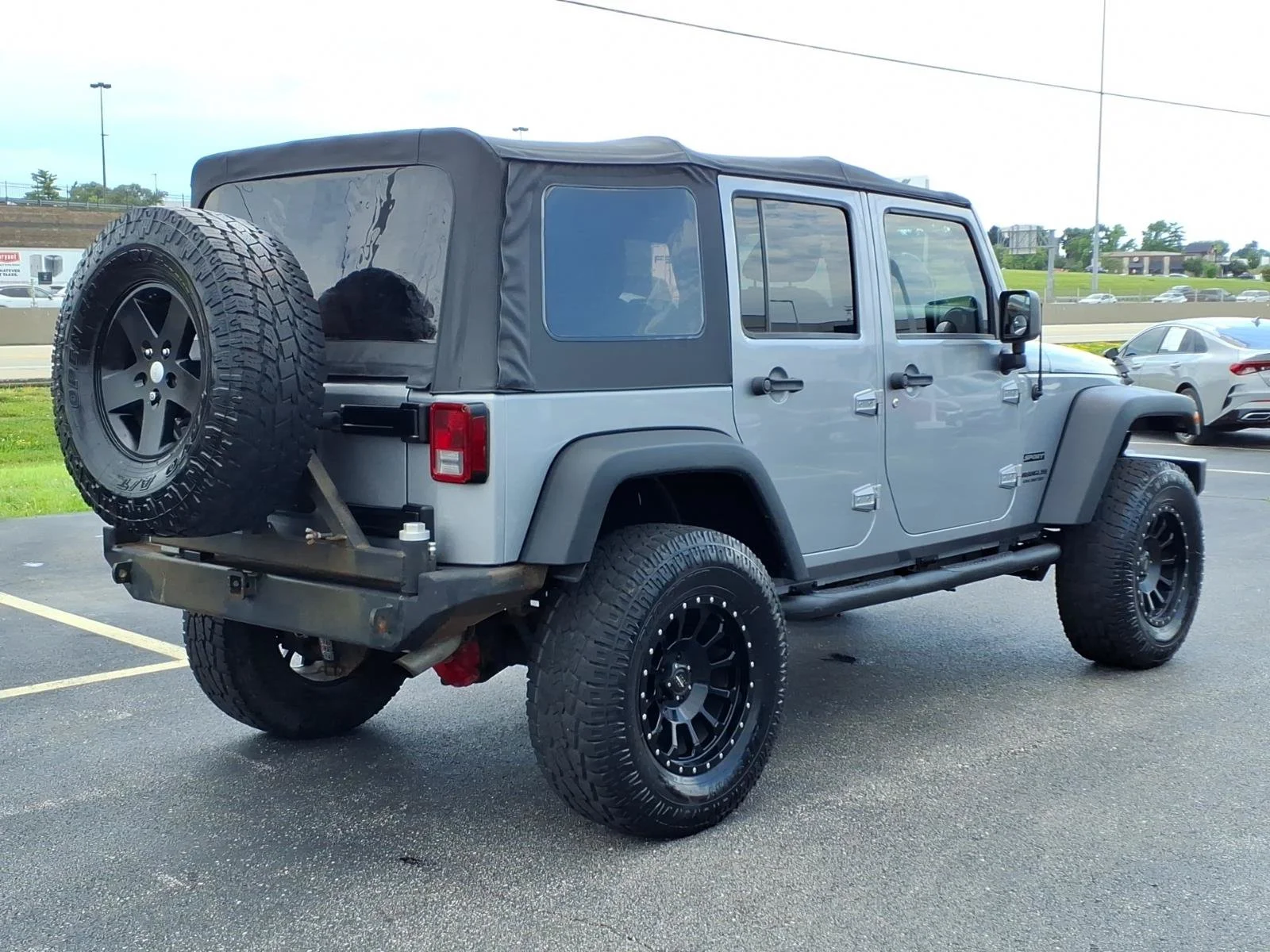 Used 2013 Billet Silver Metallic Jeep Sport image 24