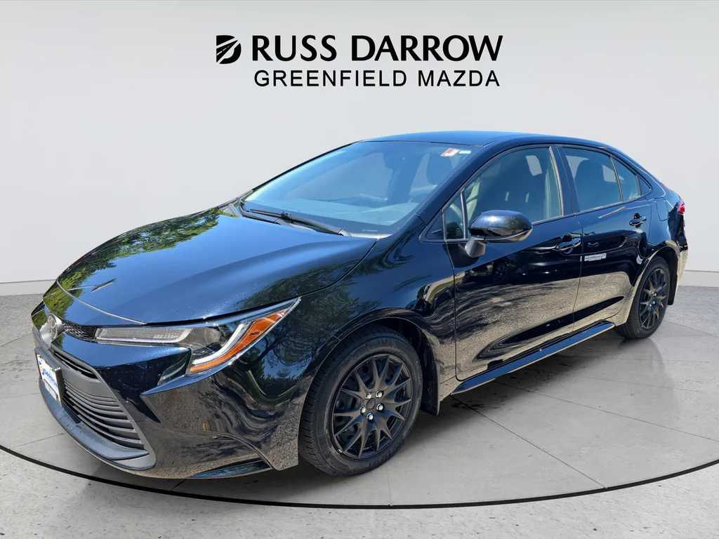 Used 2024 Black Toyota LE image 1