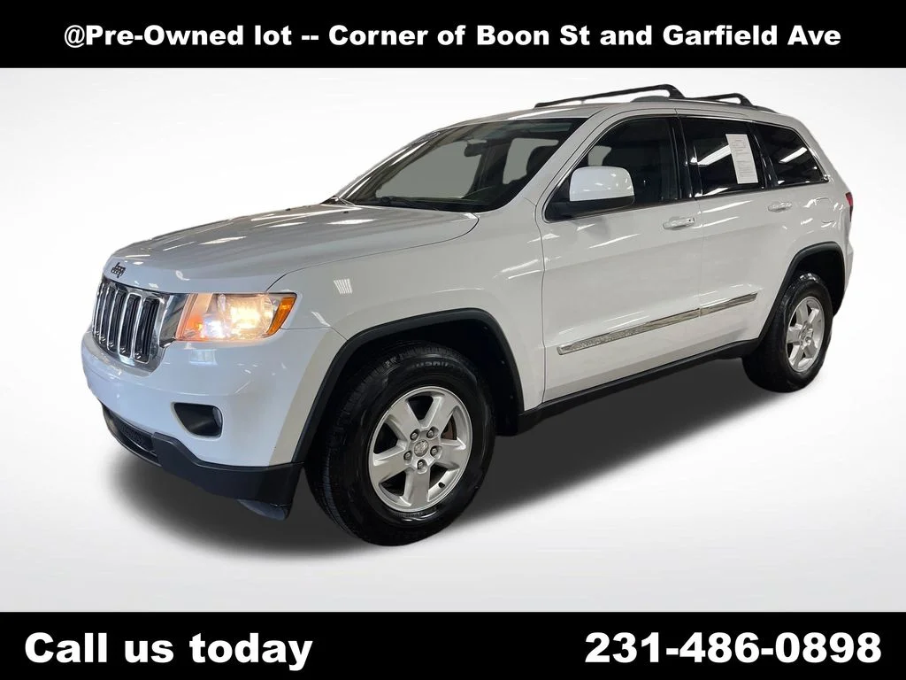 Used 2013 White Jeep Laredo image 1