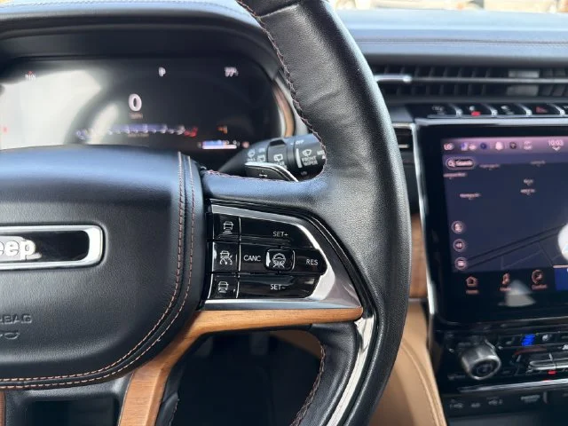 Used 2022 Black Jeep Summit Reserve image 32