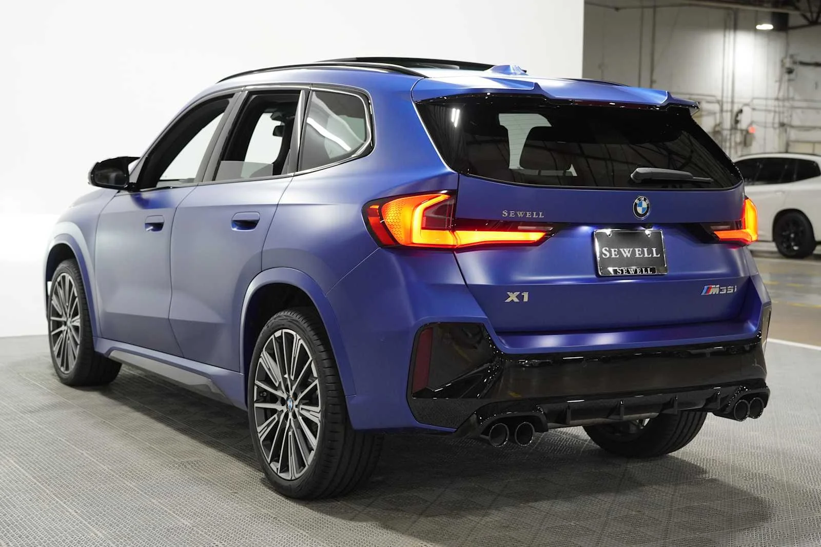 New 2026 Frozen Portimao Blue II Metallic BMW M35i image 2