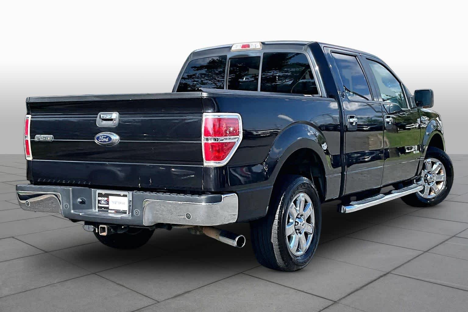 Used 2014 Tuxedo Black Metallic Ford XLT image 12