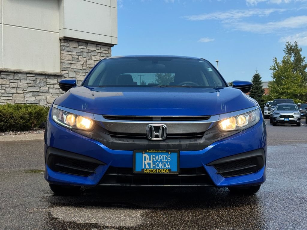 Used 2016 Honda Civic LX with VIN 19XFC2F50GE005748 for sale in Coon Rapids, MN