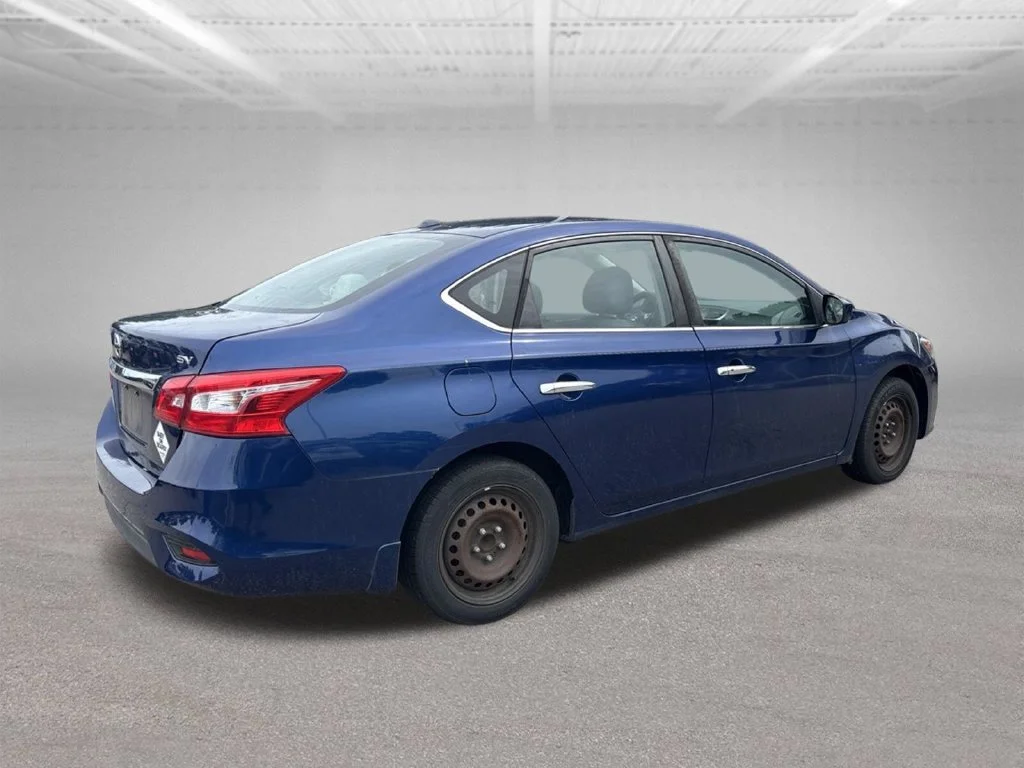 Used 2017 Blue Nissan SV image 4