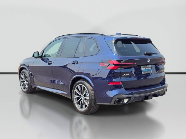 New 2026 Tanzanite Blue II Metallic BMW xDrive50e image 4