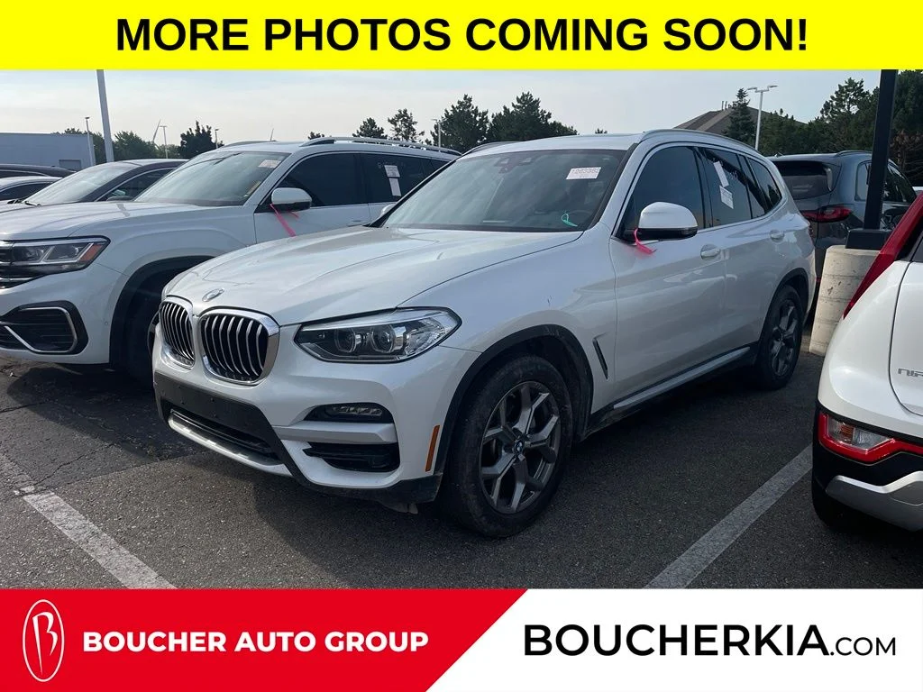 Used 2021 Mineral White Metallic BMW xDrive30i image 1
