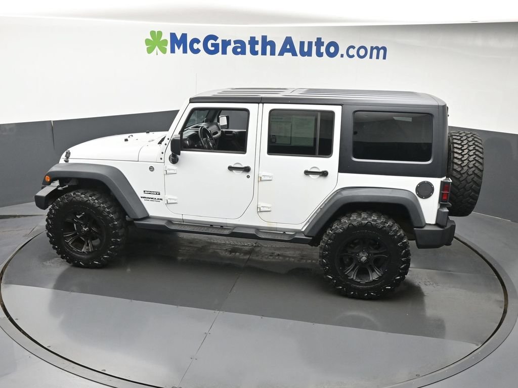 Used 2014 White Jeep Unlimited Sport image 24