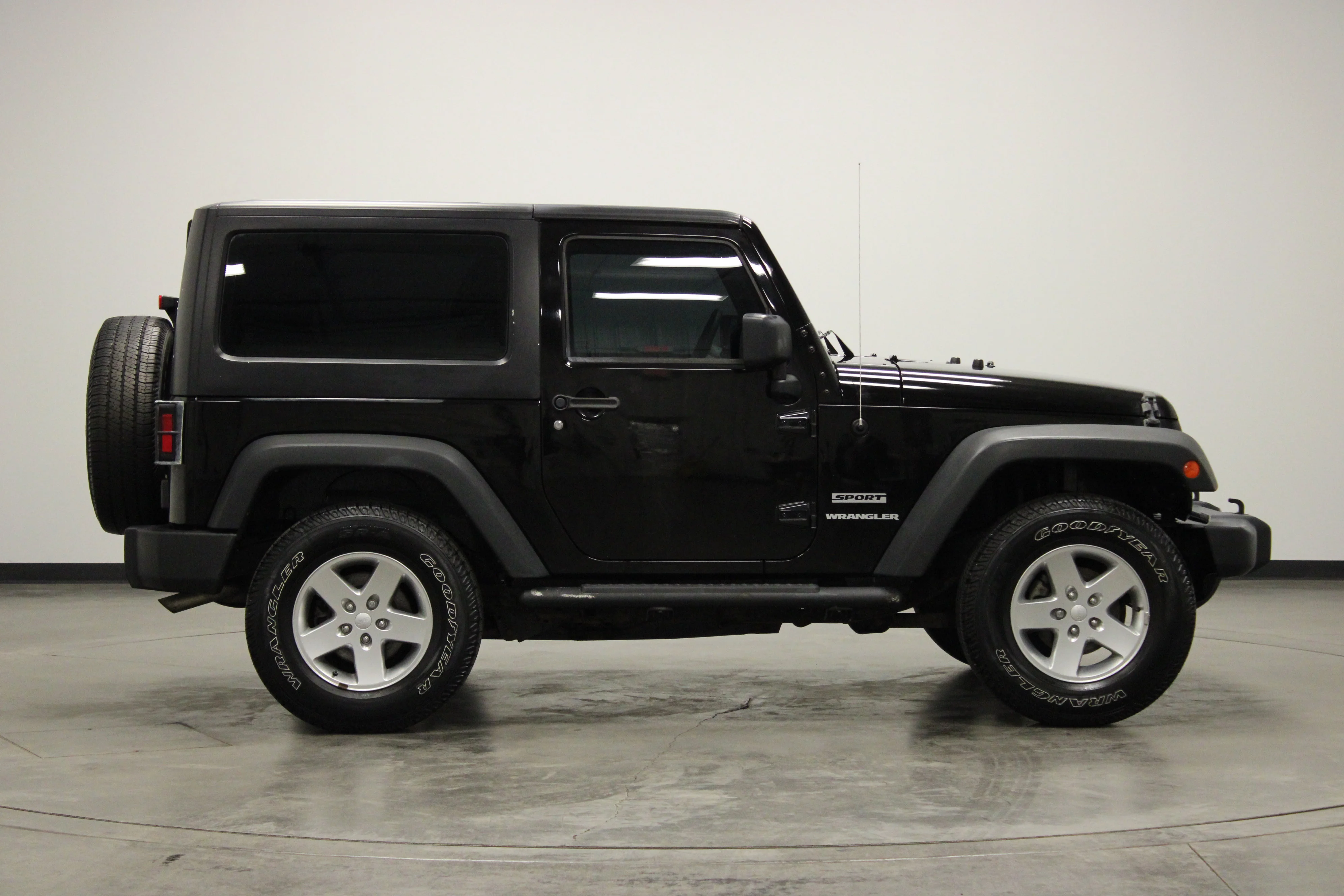 Used 2015 Black Clearcoat Jeep Sport image 9