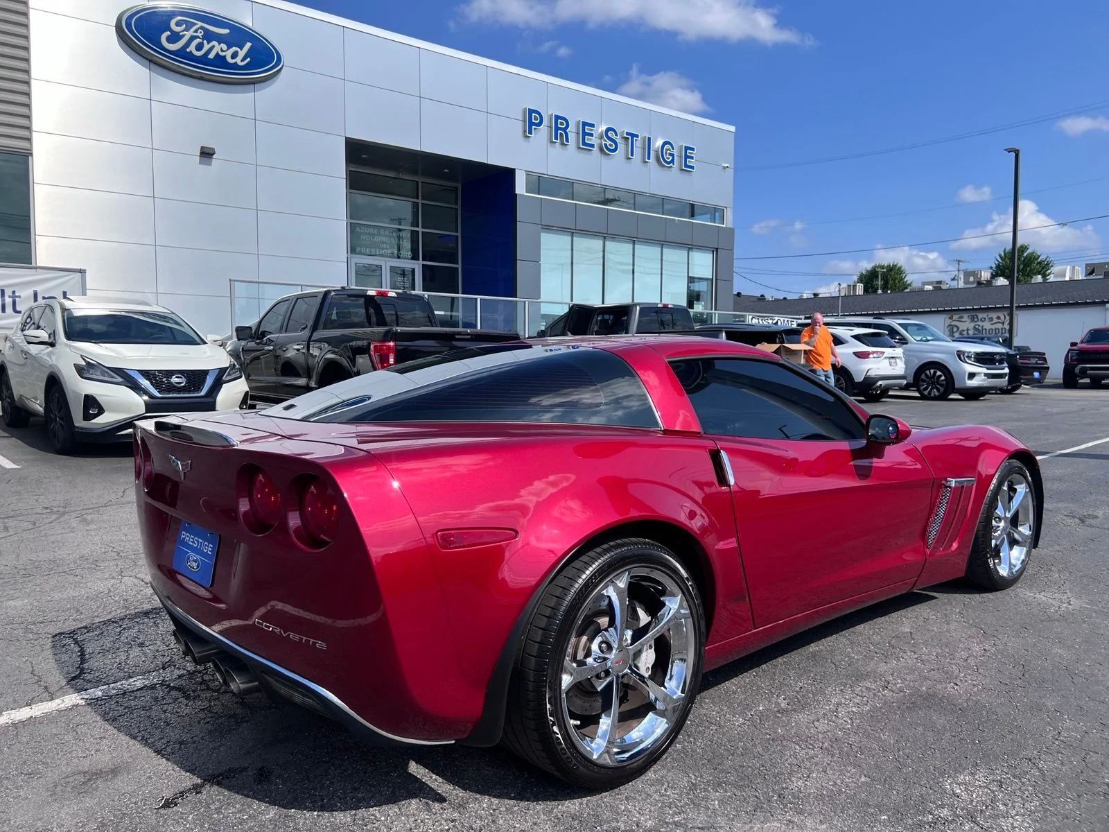Used 2012 Crystal Red Tintcoat Chevrolet Grand Sport image 11