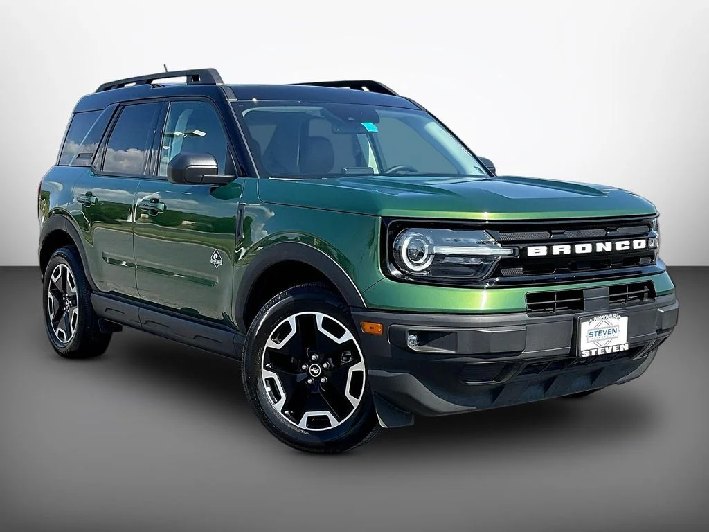 Certified Used 2024 Eruption Green Metallic Ford Outer Banks image 1