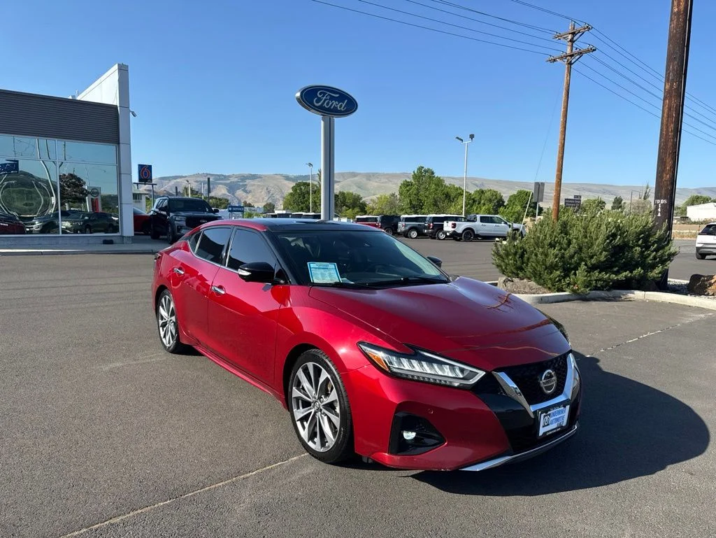 Used 2022 Scarlet Ember Nissan Platinum image 1