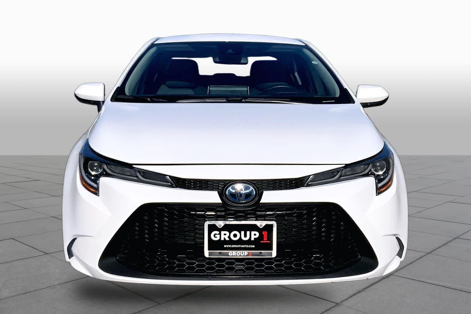 Used 2020 Super White Toyota Hybrid LE image 4