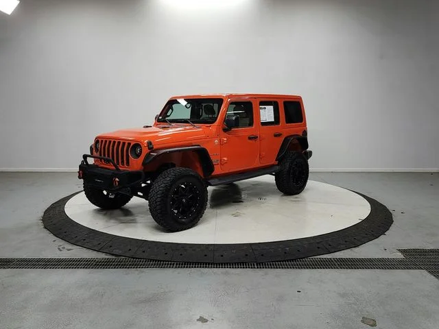 Used 2018 Orange Jeep Unlimited Sahara image 3
