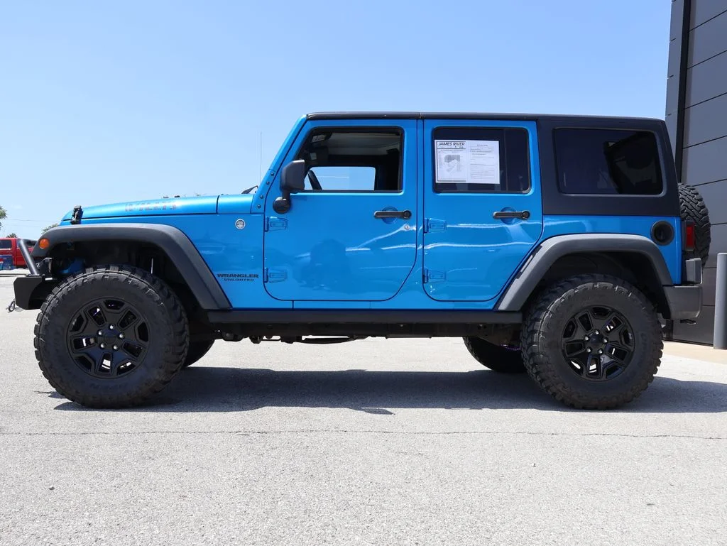 Used 2014 Jeep Wrangler Unlimited Sport with VIN 1C4BJWDG8EL318874 for sale in Ozark, MO