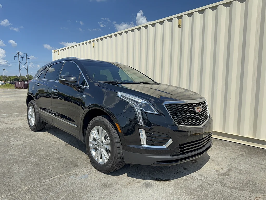 Used 2025 Stellar Black Metallic Cadillac Luxury image 1