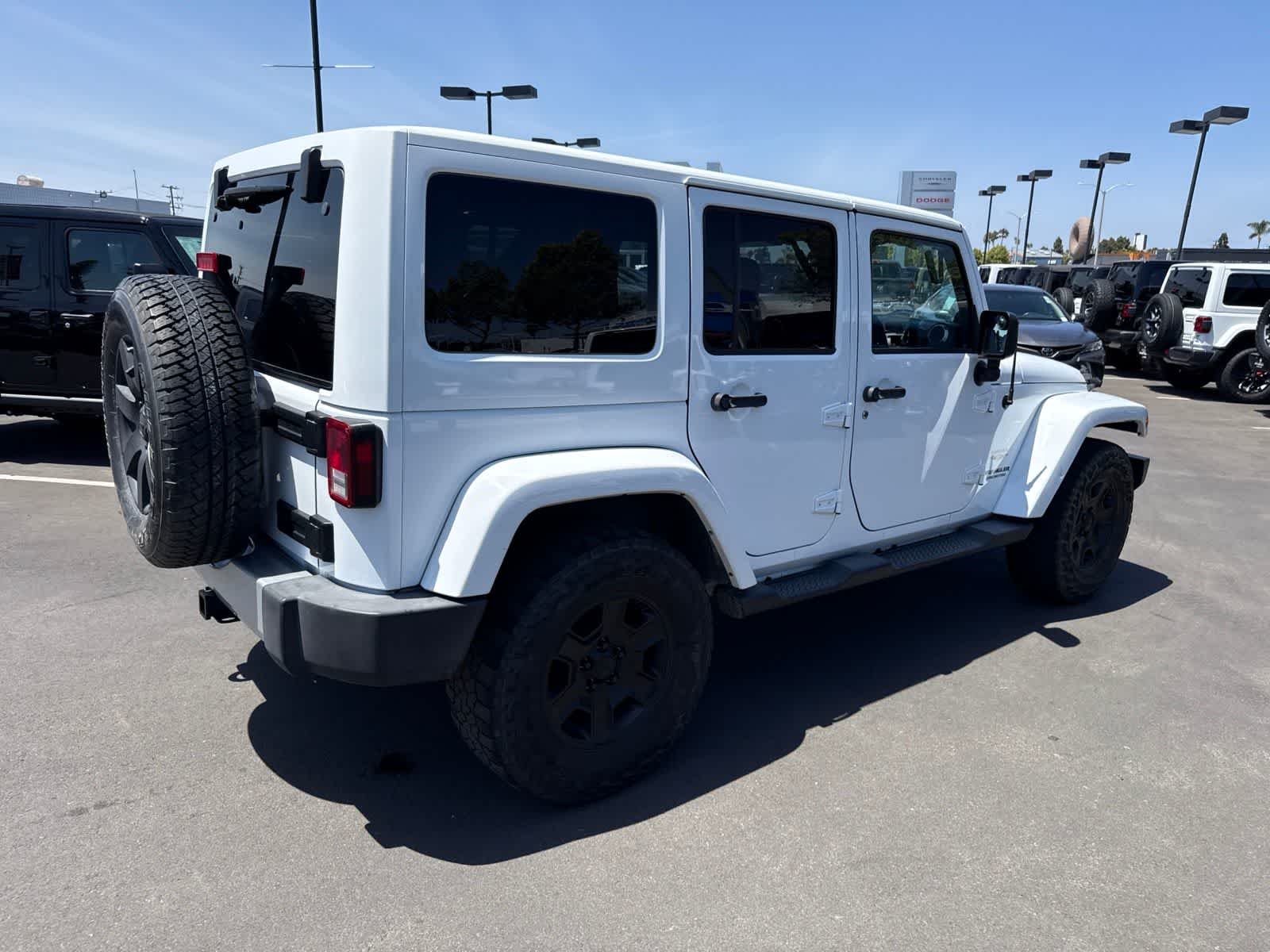Used 2014 Bright White Clearcoat Jeep Sahara image 13