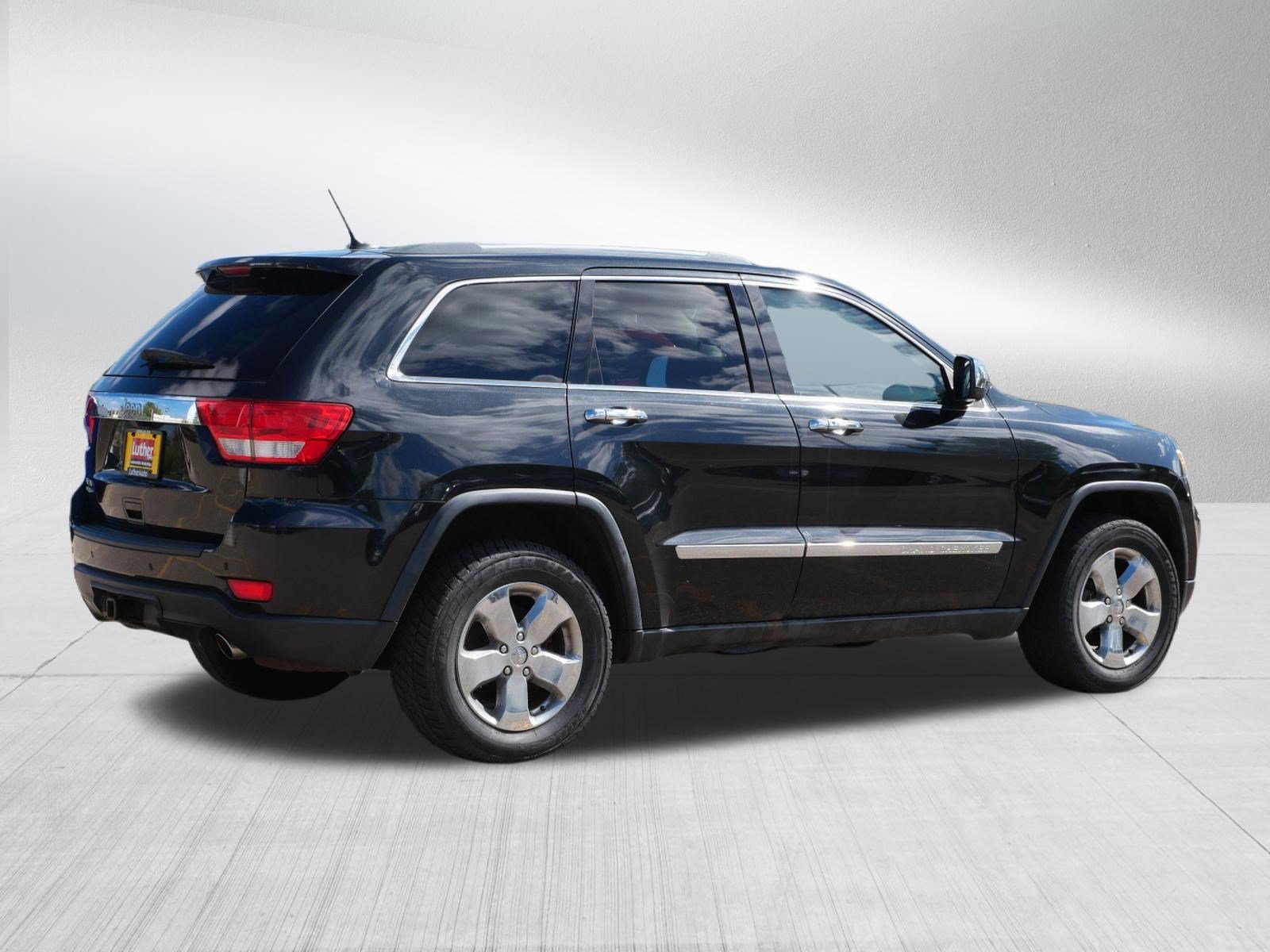 Used 2011 Brilliant Black Crystal Pearl Jeep Laredo image 7