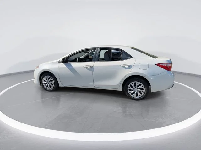 Used 2019 White Toyota LE image 6