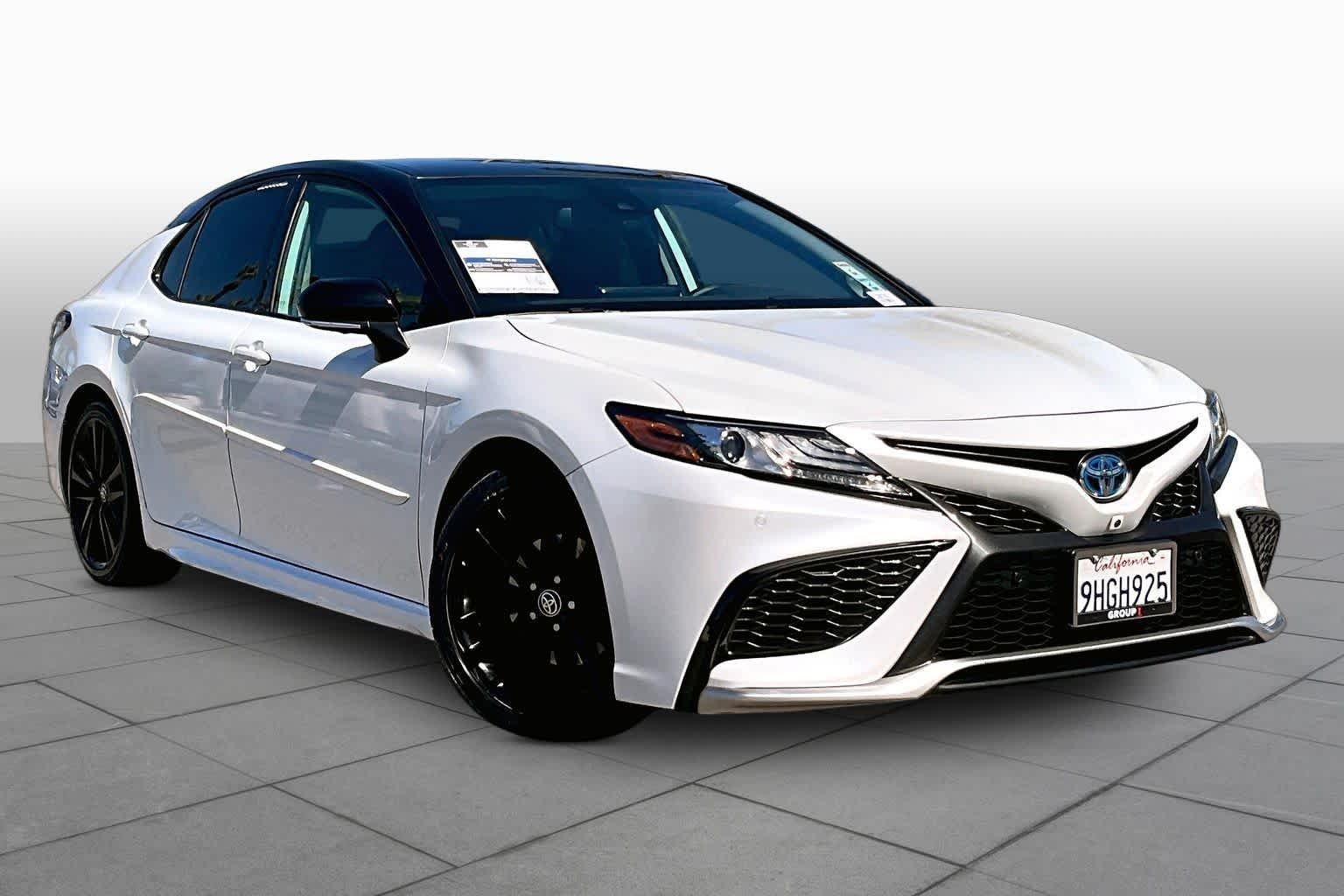Used 2023 Wind Chill Pearl/Midnight Black Metallic Toyota Hybrid XSE image 2