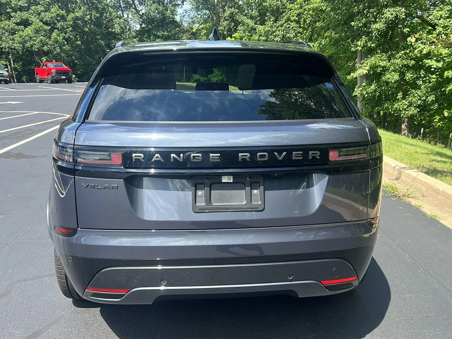 Used 2024 Varesine Blue Metallic Land Rover Dynamic SE image 4