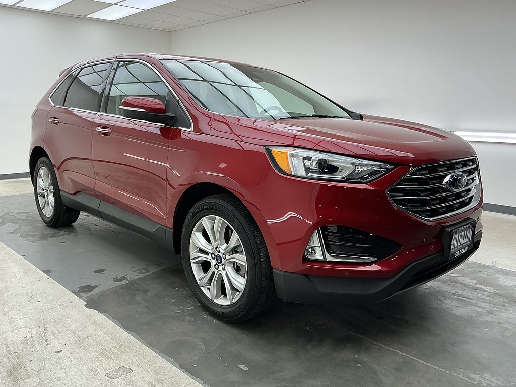 Certified Used 2021 Rapid Red Metallic Tinted Clearcoat Ford Titanium image 3
