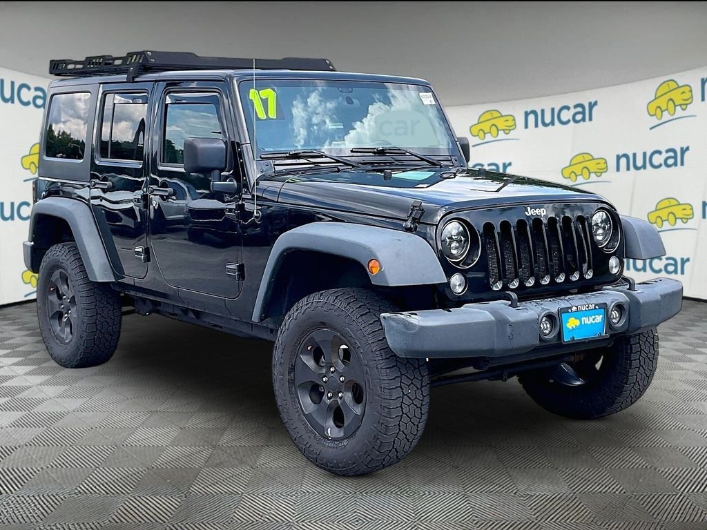 Used 2017 Black Clearcoat Jeep Unlimited Sport image 1