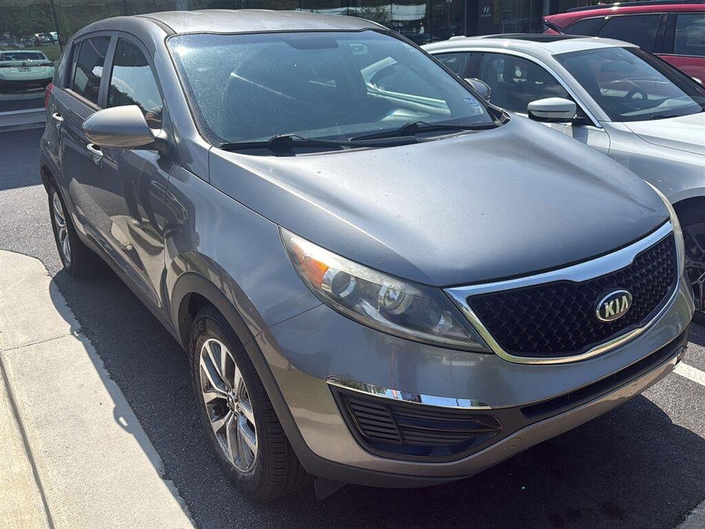 Used 2016 Mineral Silver Kia LX image 1