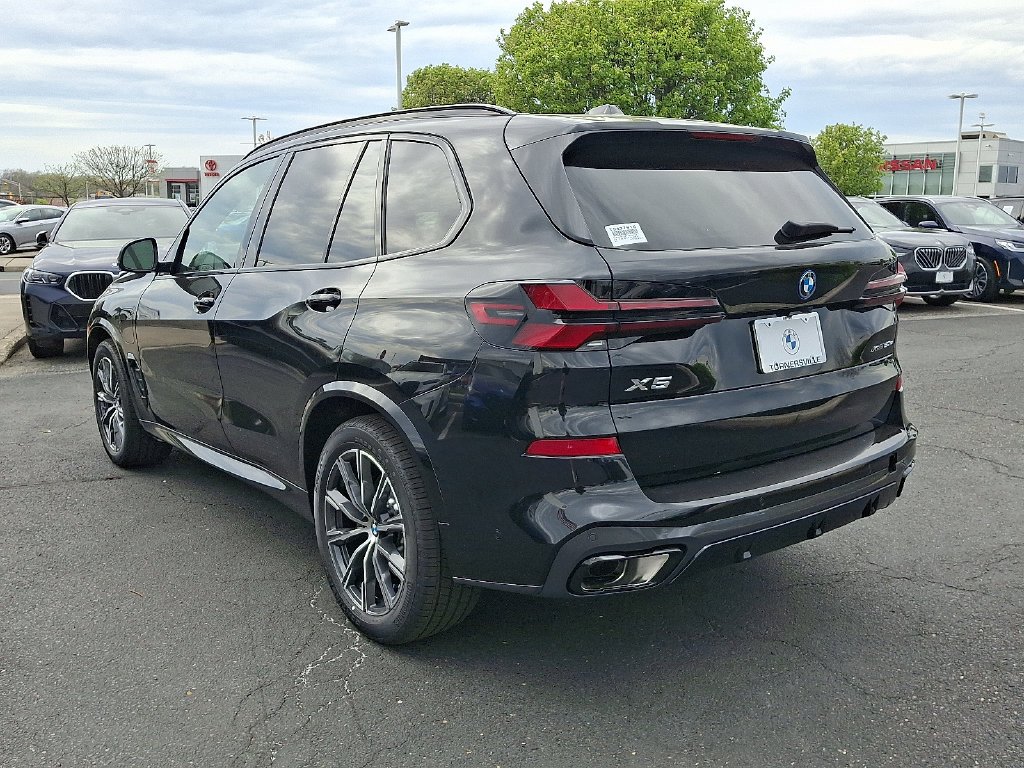 Used 2026 Black Sapphire Metallic BMW xDrive50e image 3