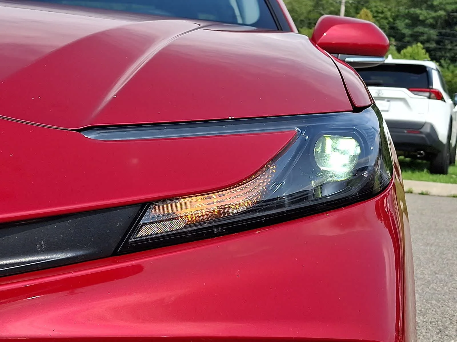 Certified Used 2025 Supersonic Red Toyota LE image 11