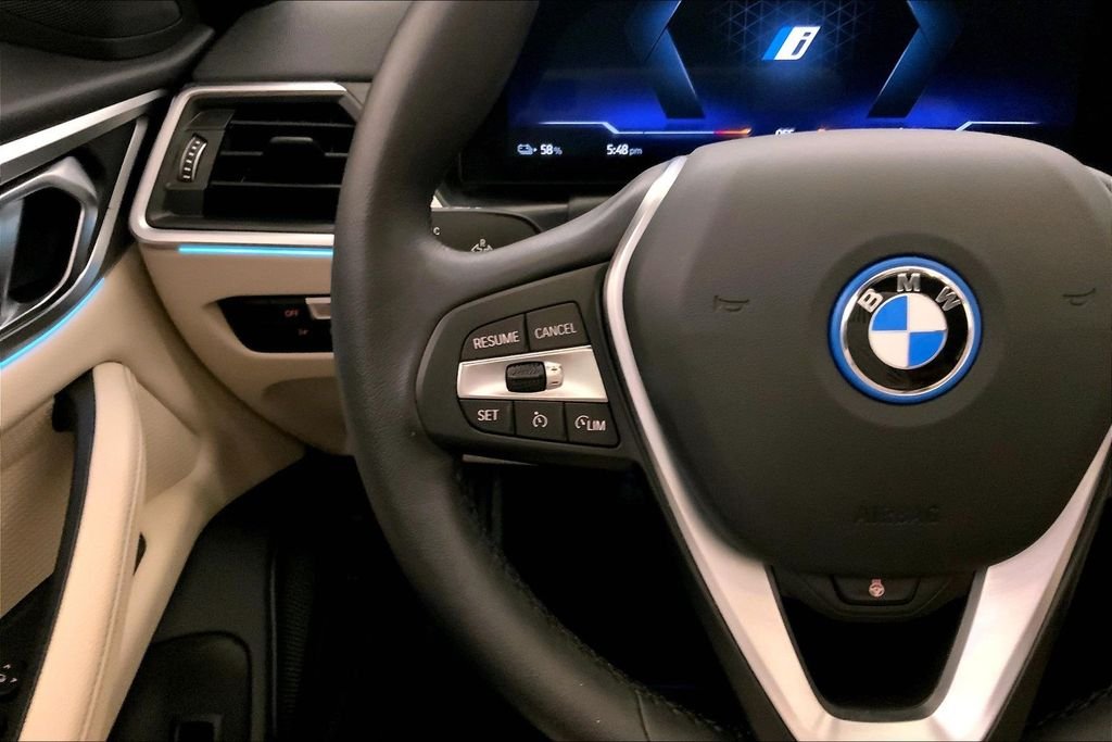 Used 2023 Sunset Orange Metallic BMW  image 17