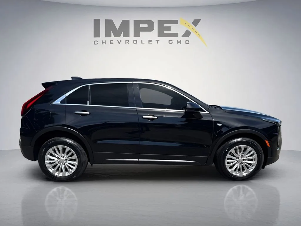 Used 2024 Stellar Black Metallic Cadillac Luxury image 6