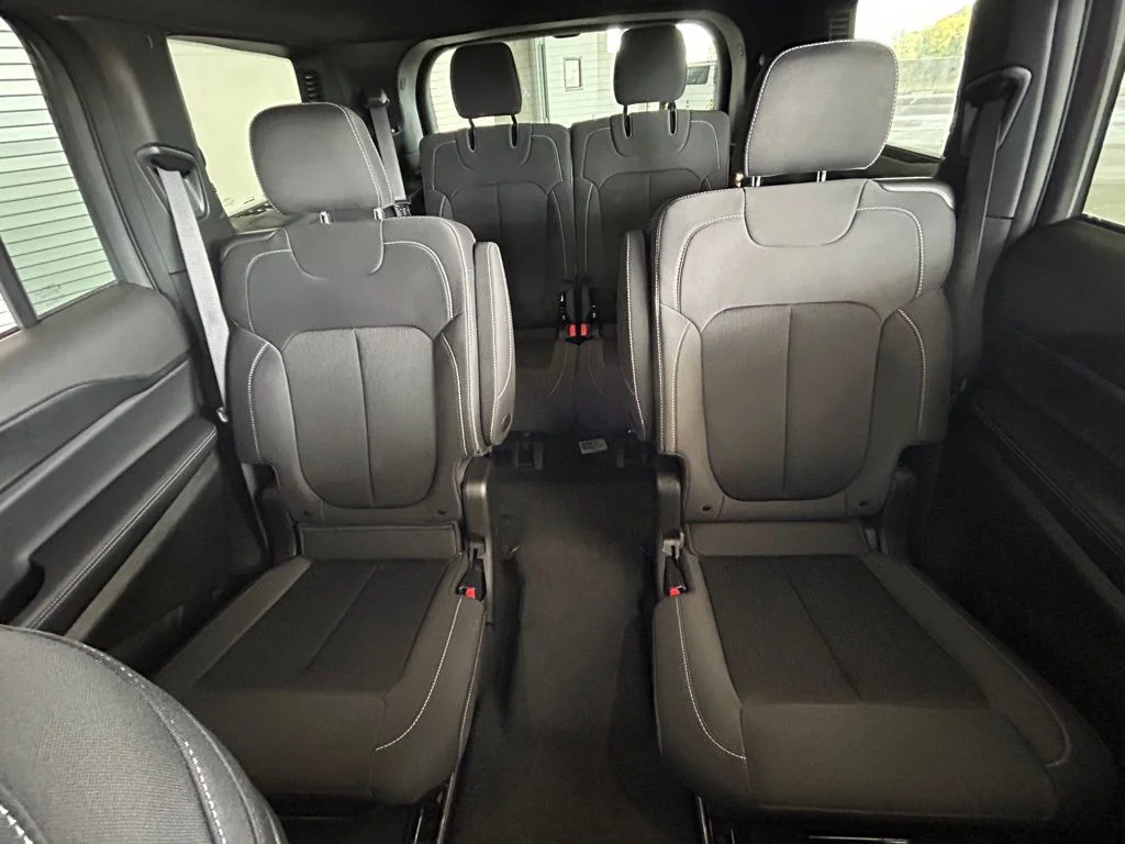 Used 2025 Bright White Clearcoat Jeep Laredo image 13