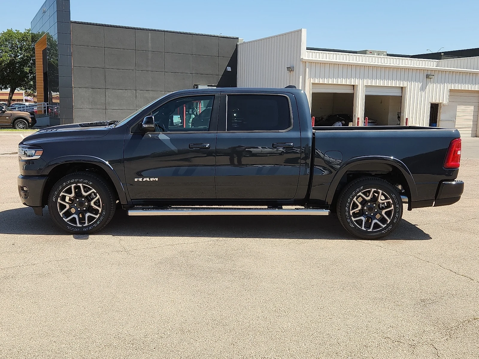 New 2026 Forged Blue Metallic  Paint Ram LARAMIE CREW CAB 4X4 5