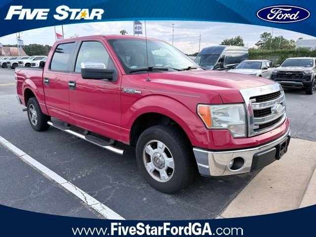 Used 2013 Red Ford XLT image 1