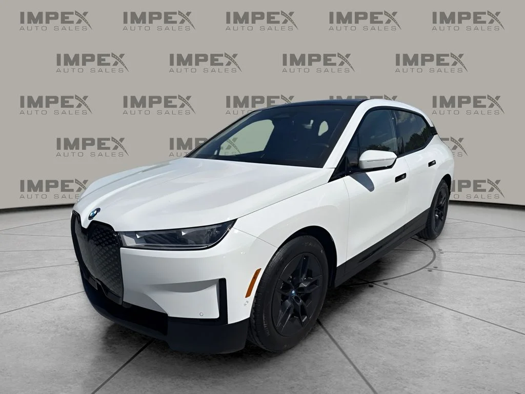 Used 2023 White BMW xDrive50 image 1