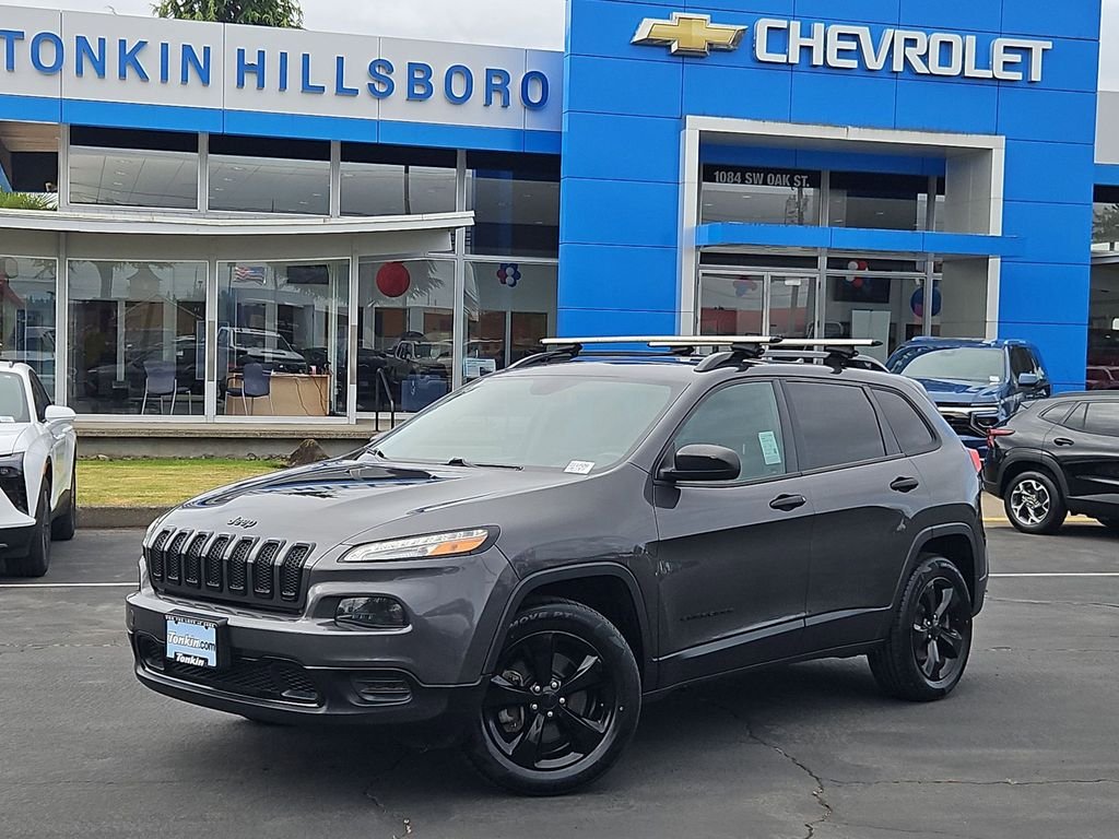 Used 2016 Granite Crystal Metallic Clearcoat Jeep Sport image 2