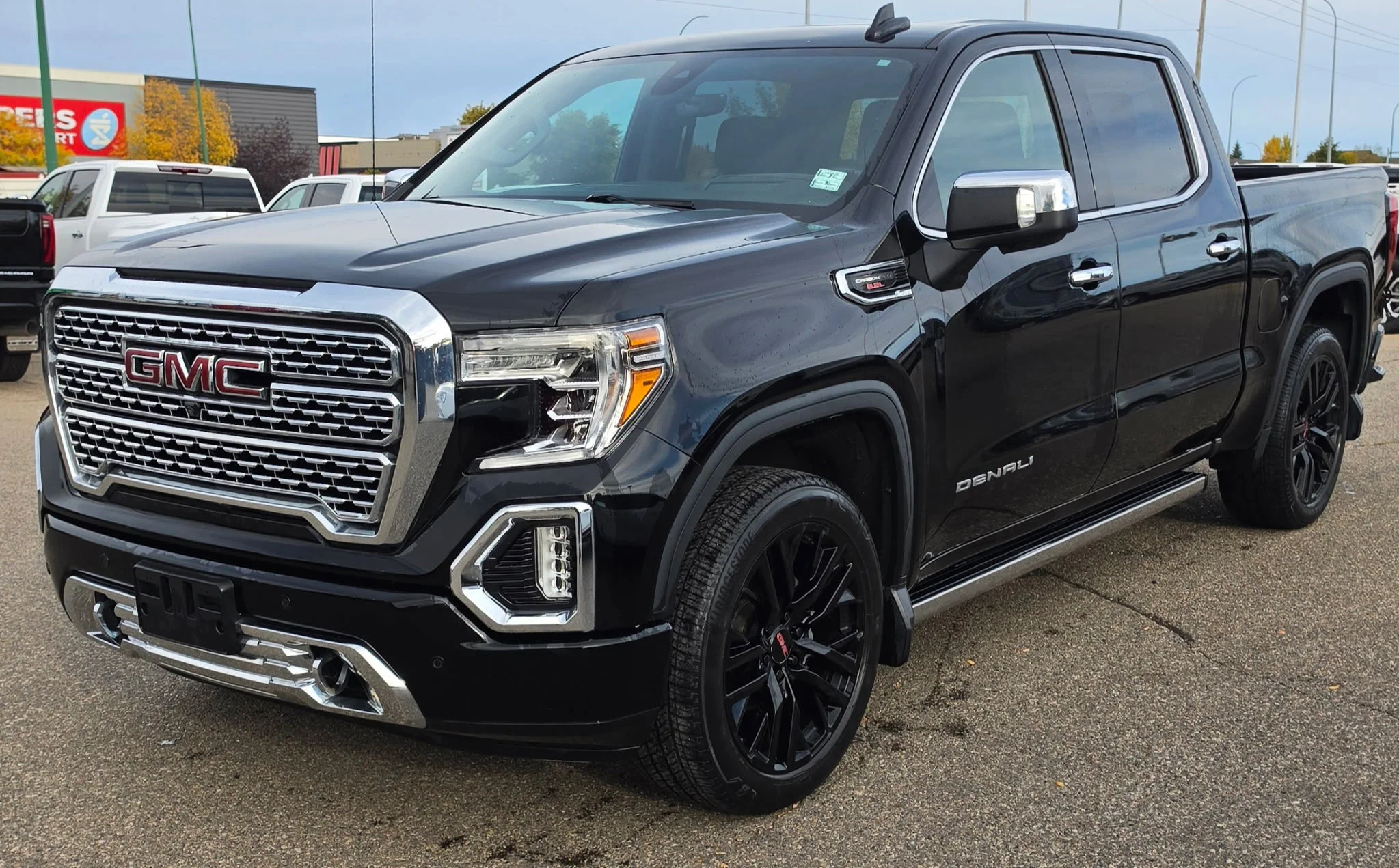 Used 2020 Black GMC Denali Crew Cab image 1