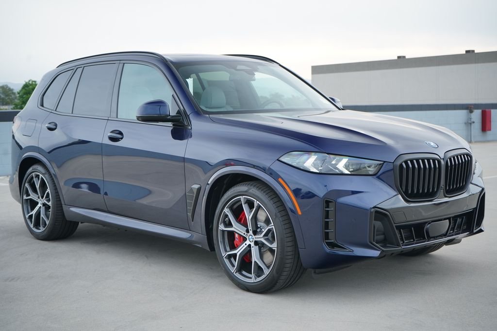 New 2026 Tanzanite Blue II Metallic BMW xDrive50e image 3