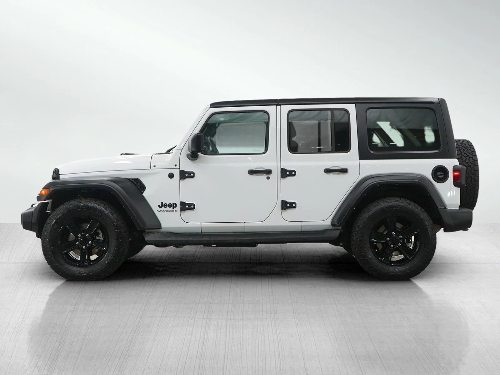 Used 2023 Jeep Wrangler 4-Door Altitude with VIN 1C4HJXDG9PW578380 for sale in Burnsville, Minnesota