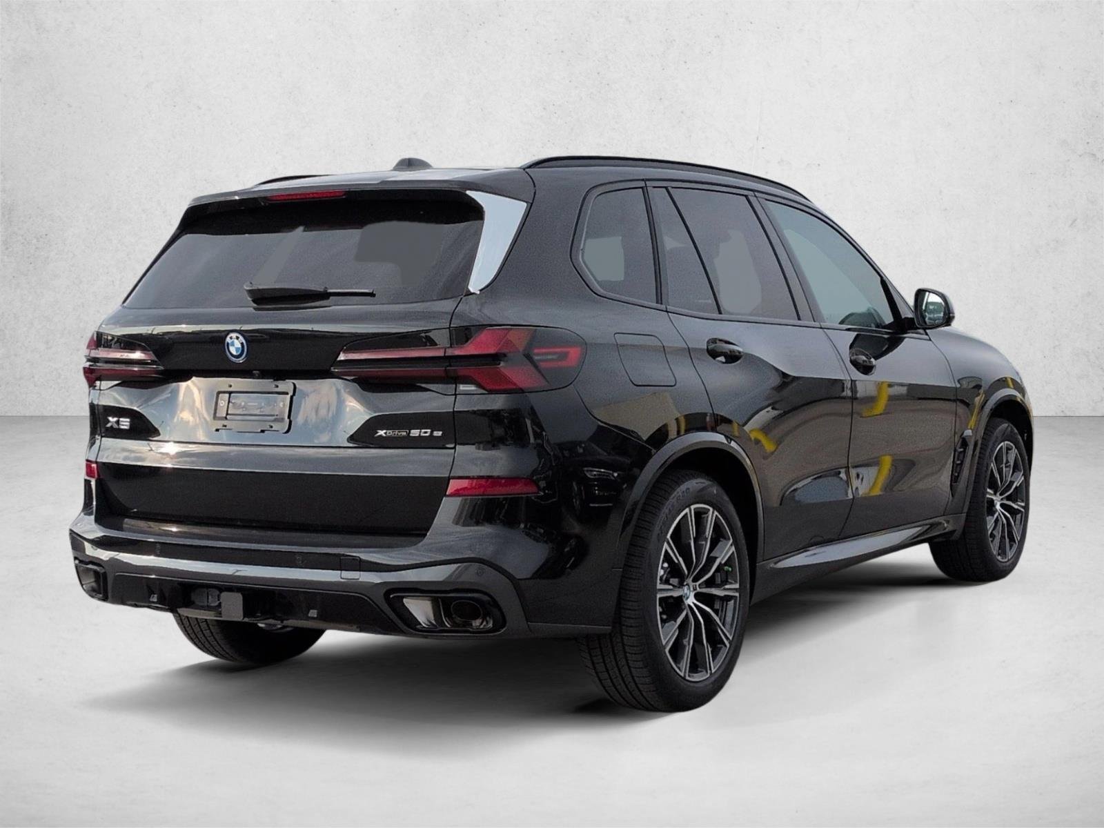 Used 2026 Black Sapphire Metallic BMW xDrive50e image 2