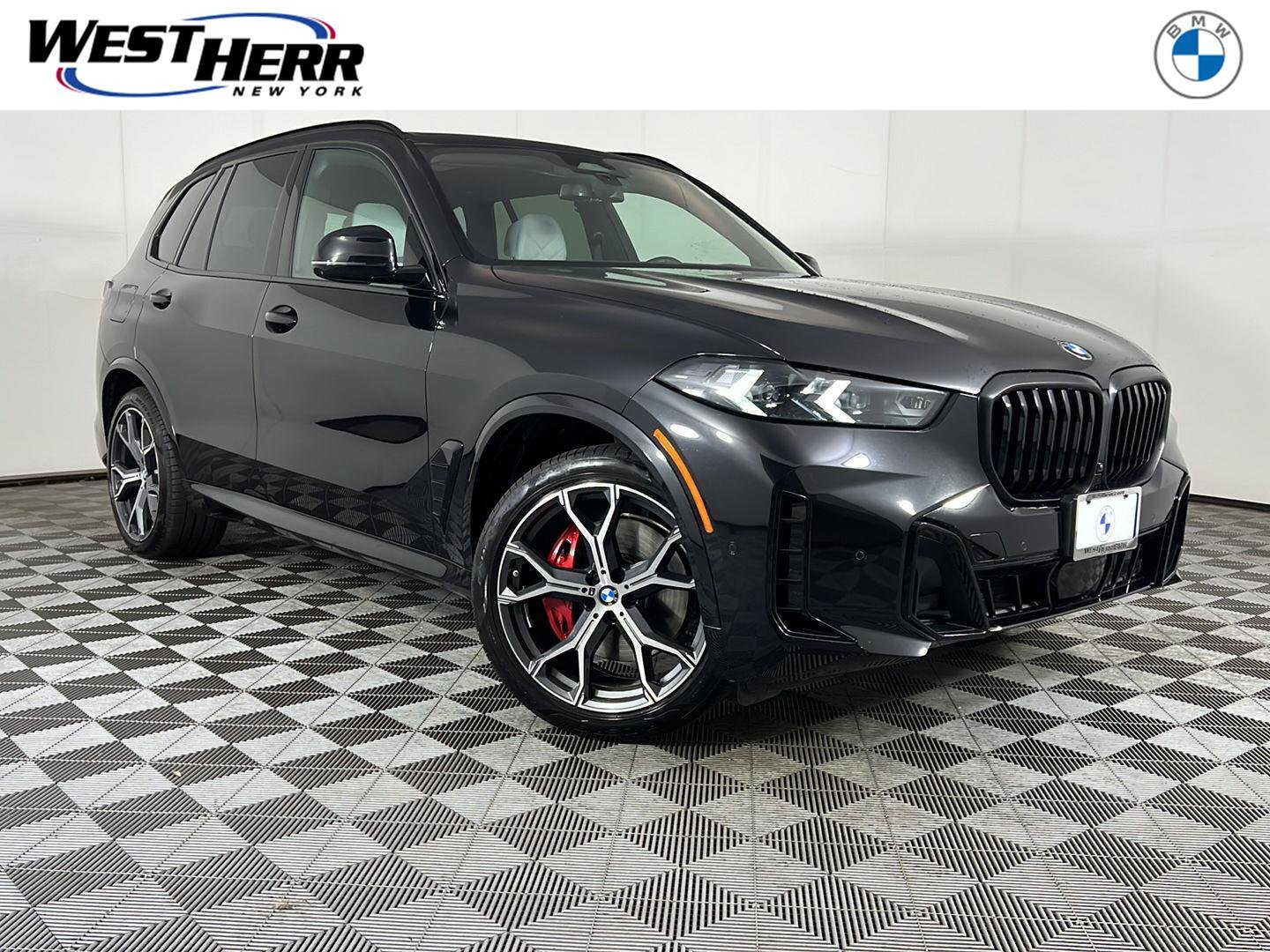 New 2026 Black Sapphire Metallic BMW xDrive40i image 1