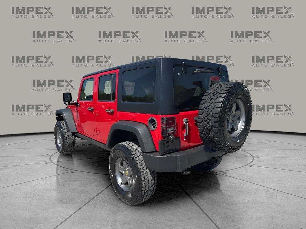 Used 2012 Red Jeep Unlimited Rubicon image 3
