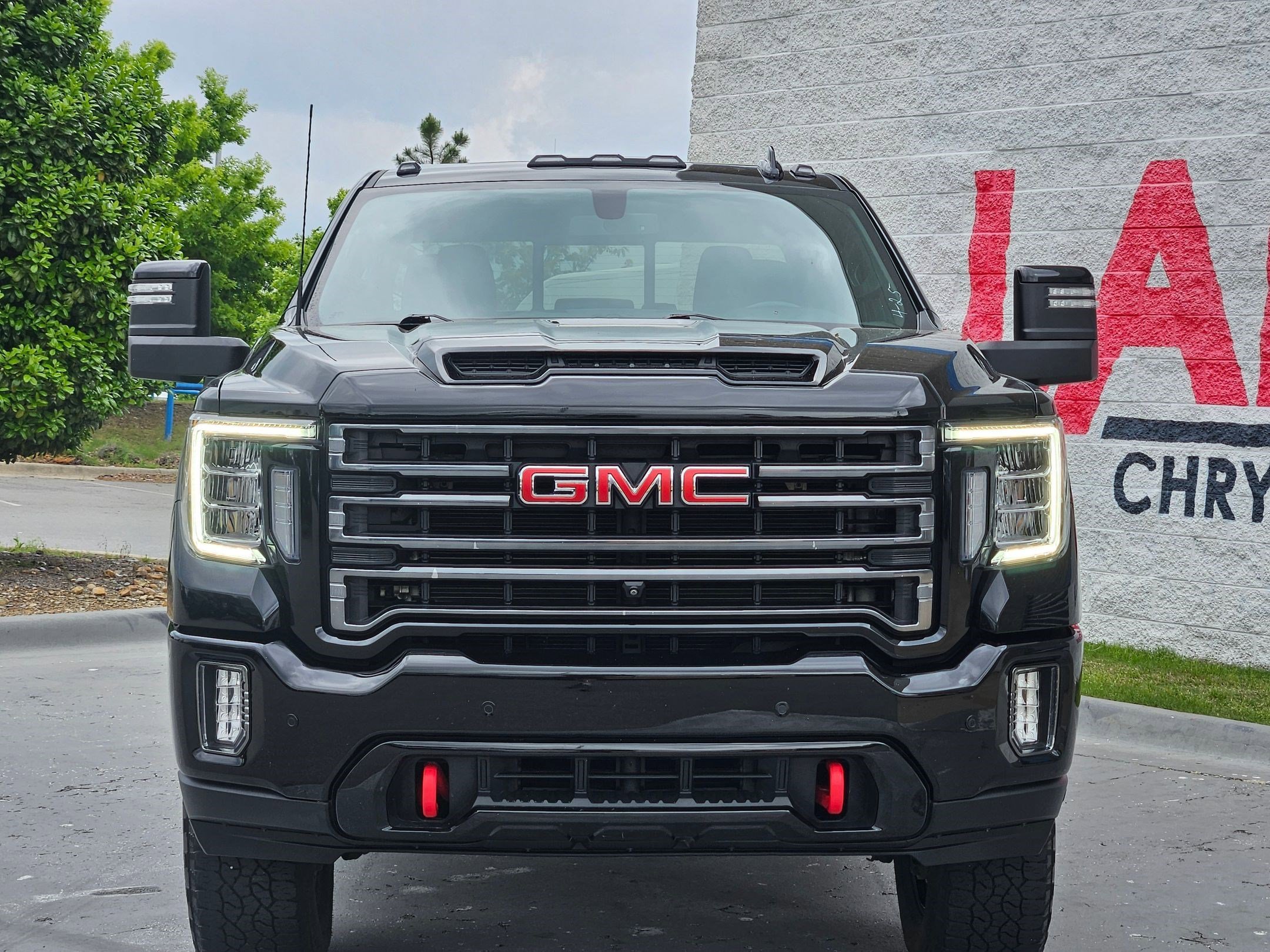 Used 2022 GMC Sierra 2500HD AT4 with VIN 1GT49PEY5NF207731 for sale in Little Rock