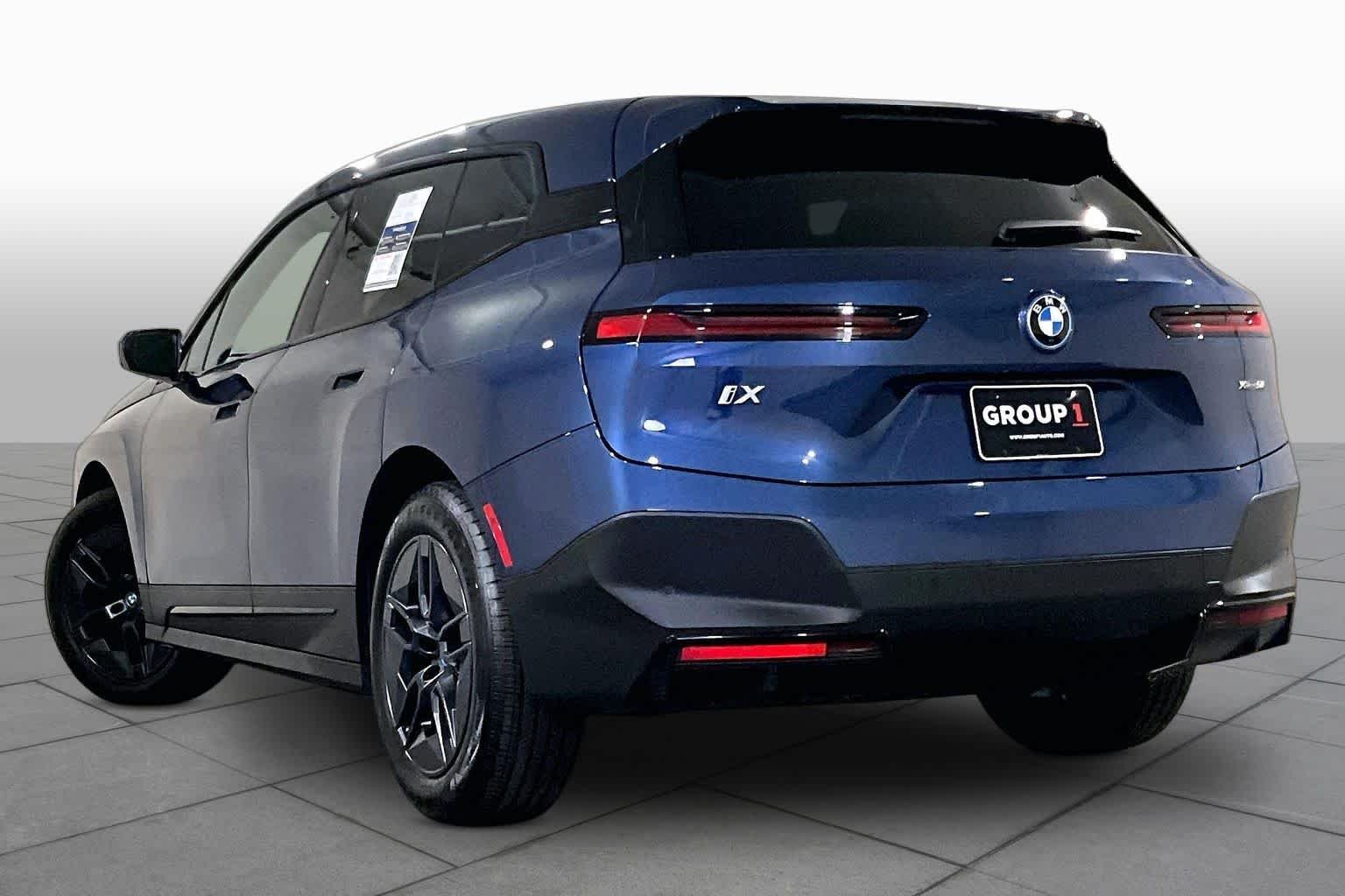 Used 2024 Phytonic Blue Metallic BMW xDrive50 image 11