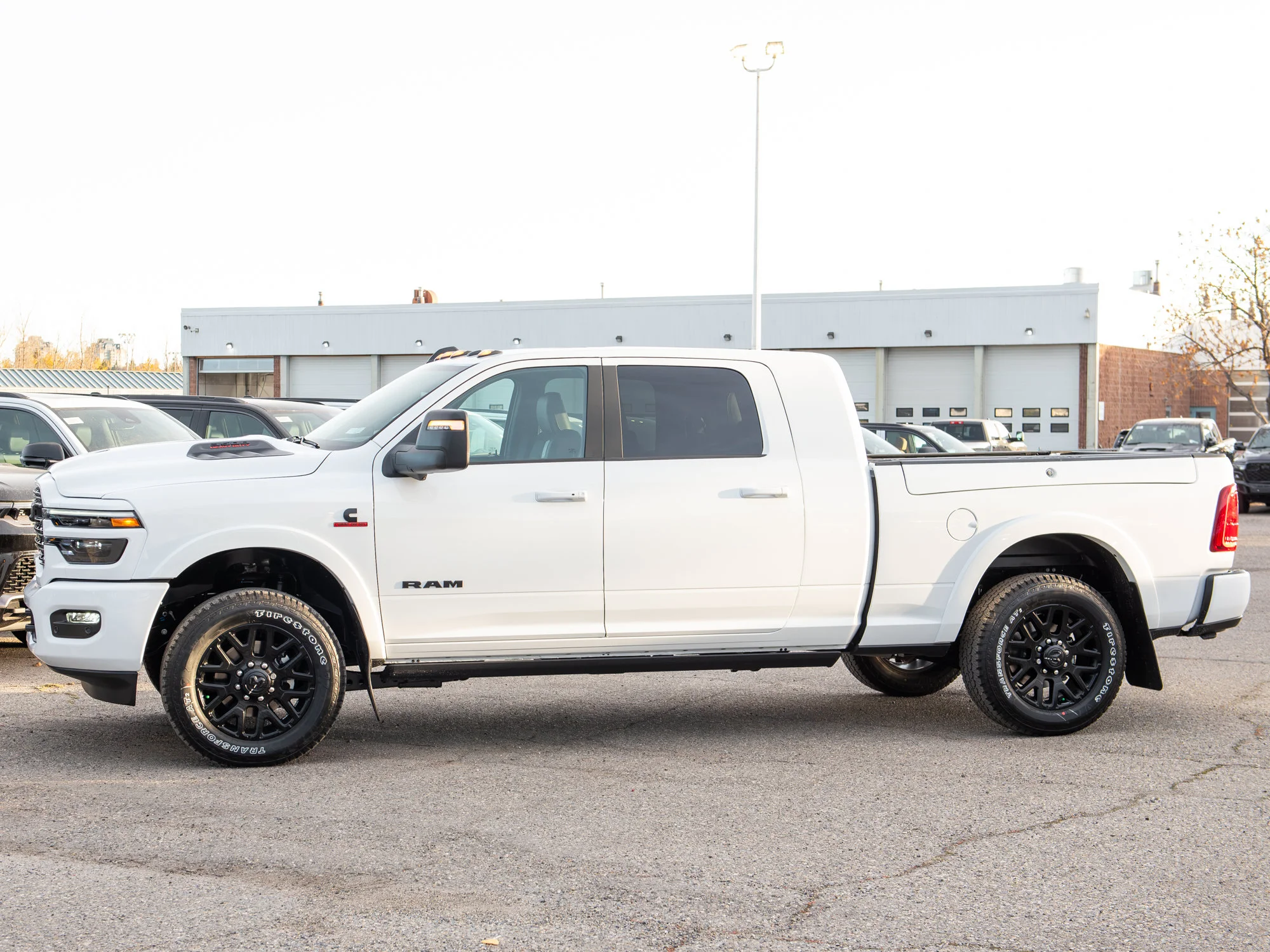 New 2027 White RAM Limited Night* Mega Cab 4x4, Tow-Tech Plus Group, Sunroof, Passenger Screen image 3