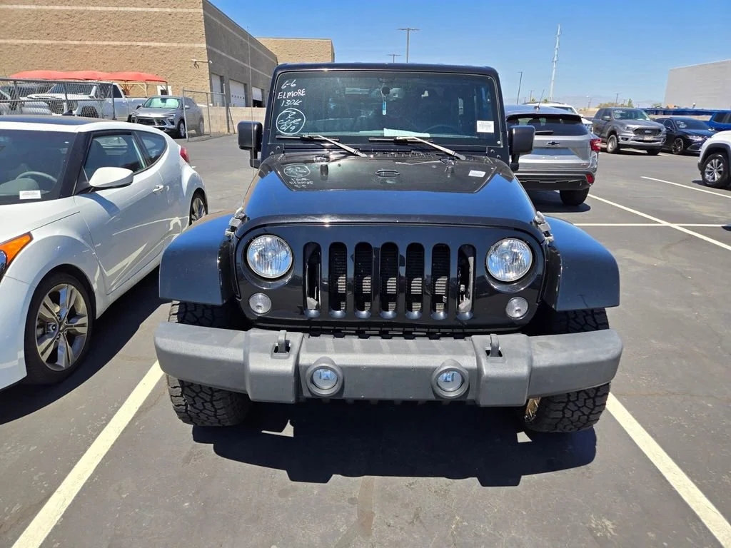 Used 2015 Black Clearcoat Jeep Sahara image 4