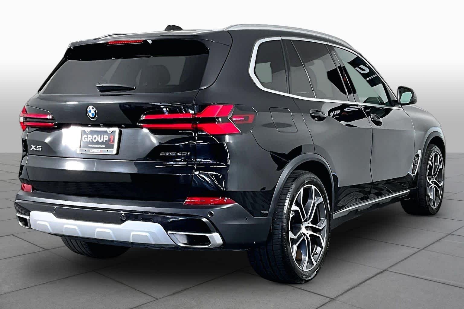 Used 2024 Black Sapphire Metallic BMW sDrive40i image 13