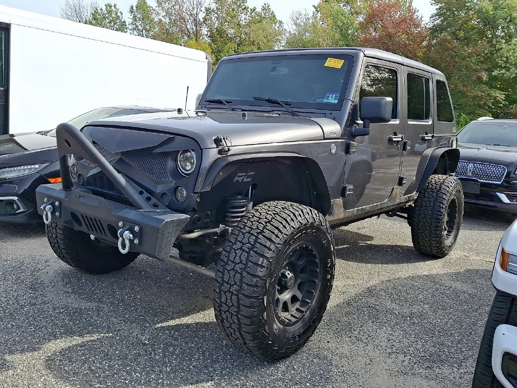 Used 2017 Gray Jeep Unlimited Sport image 4