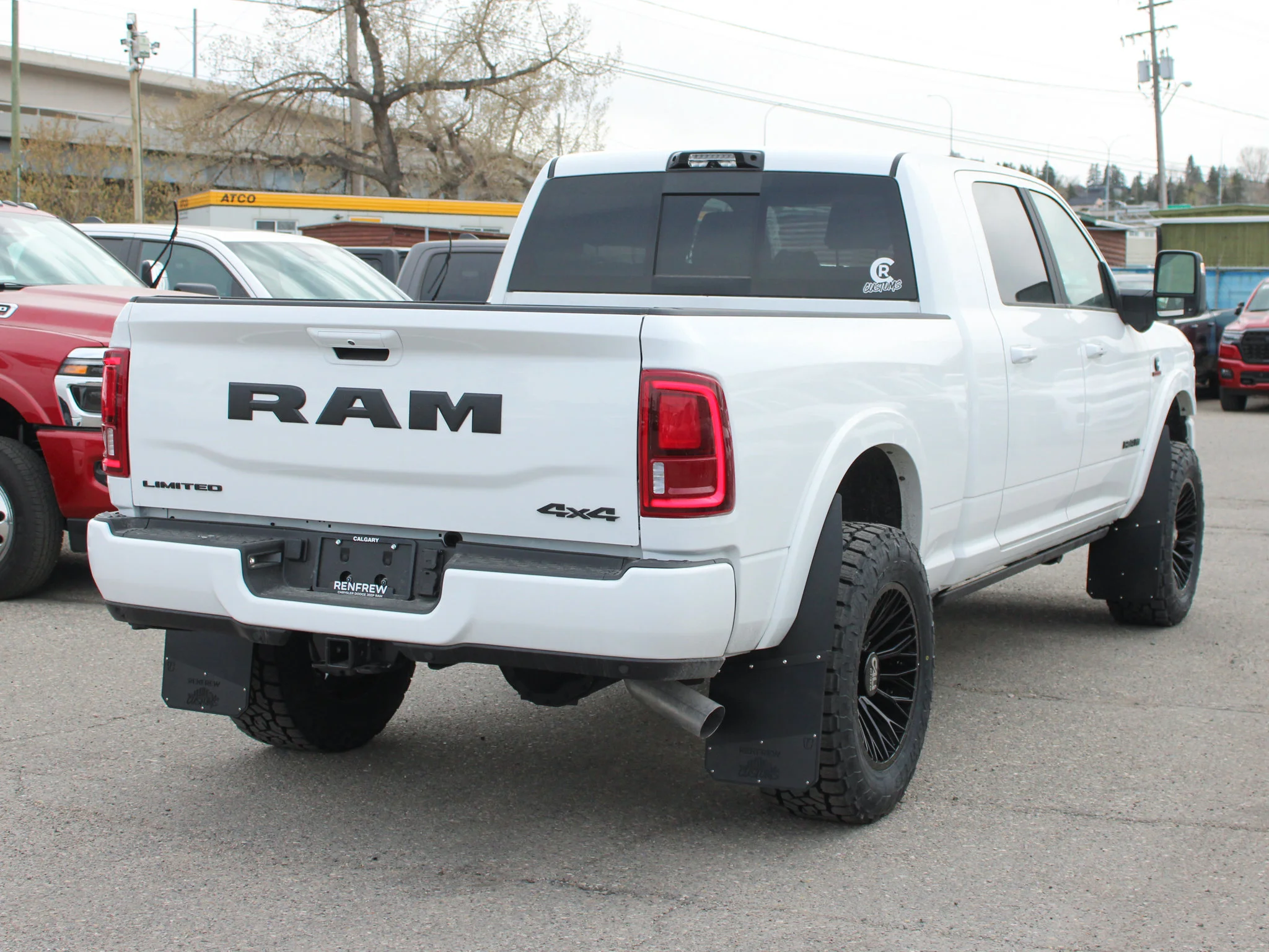 New 2026 White RAM Limited* Mega Cab, 2 Inch Lift, 35 Inch Tires, Trigger Industries Mudflaps image 7
