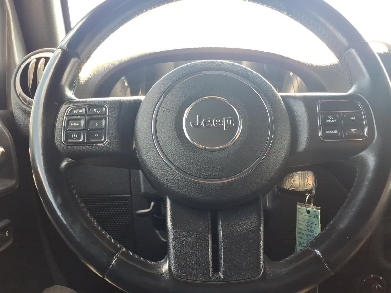 Used 2015 Billet Silver Metallic Clearcoat Jeep Sport image 24